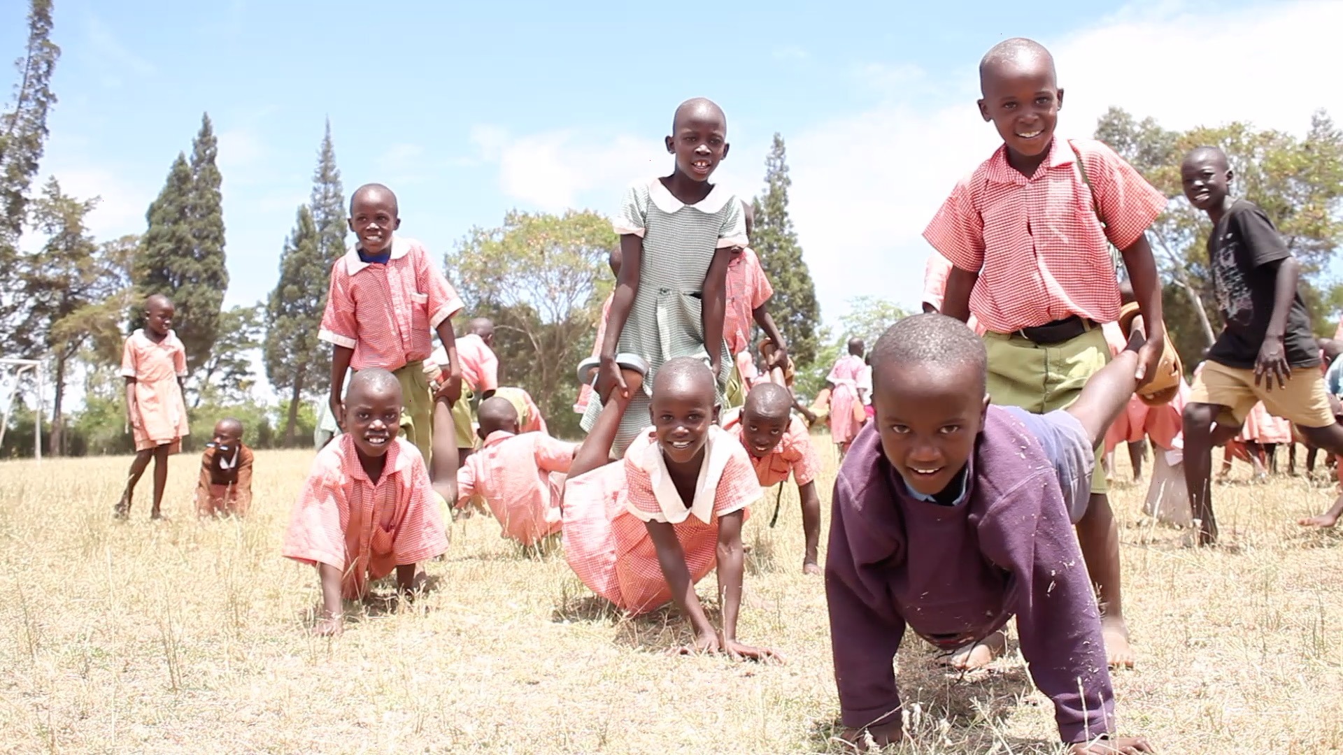 Children at AIDS orphanage in Kenya playing.