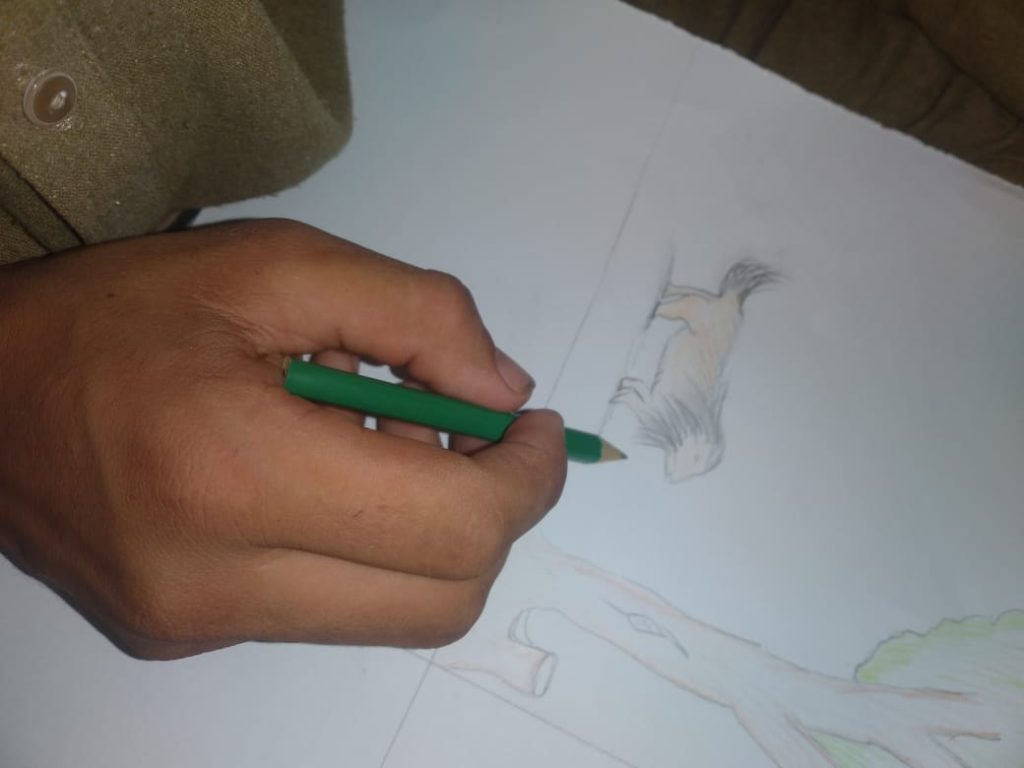 Child drawing during storytelling even in Pakistan