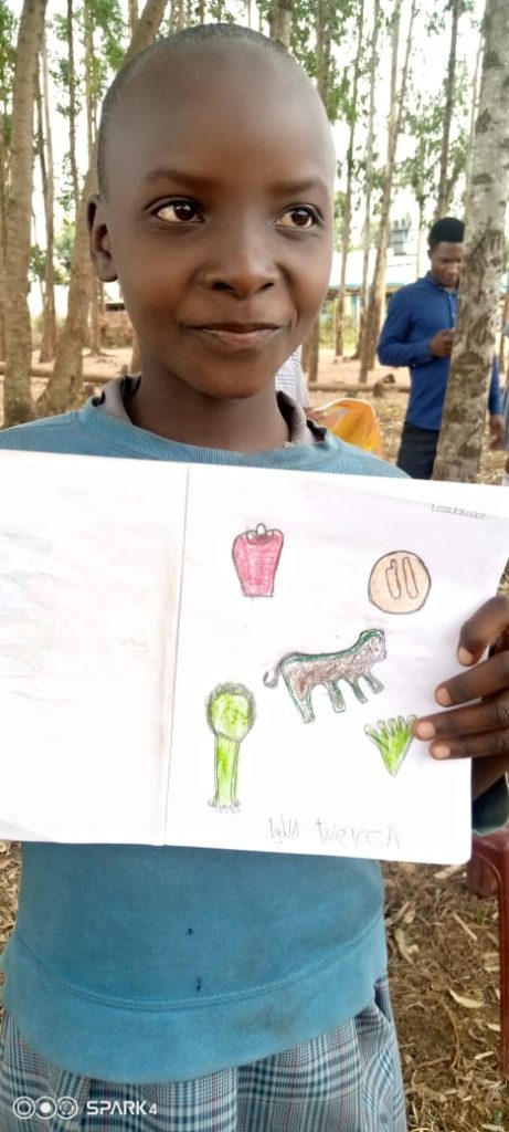 Boy showing his drawing storytelling program